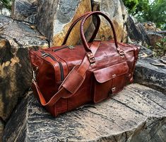 Leather Duffel Bag For Men, Leather Travel Bag, Duffle Bag for Men, Handmade Leather weekender Bag, Handmade Leather duffle If you have any query then just message me and get response within 5 minutes. Happy Shopping..  * Description of the Duffel Bag  *  *Size 1: 20 X 10 X 10 Inches || 50 X 25 X 25 cm (Width X Height X Depth).    *Size 2: 24 X 11 X 11 Inches || 61 X 28 X 28 cm (Width X Height X Depth).    *Size 3: 28 X 12 X 12 Inches || 71 X 30 X 30 cm (Width X Height X Depth). * Material: Genu Brown Satchel For Travel, Large Leather Travel Bag Ideal As Gift, Brown Leather Travel Bag For Gift, Brown Leather Travel Bag As Gift, Brown Leather Travel Bag Gift, Soft Leather Bags For Gifts, Leather Backed Satchel Bag As A Gift, Leather-backed Satchel Bag As Gift, Large Capacity Rectangular Duffle Bag As Gift