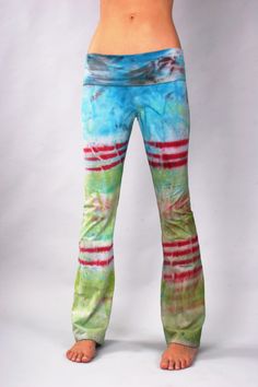 "Using Plant-Based Dye, Organic USA Cotton & High Quality Spandex 96% cotton; 4% spandex HAND MADE IN THE DREAM STATES USA by Tristan & Hannah Items will be hand painted just like listings you see above. We will then create some awesome art images based on the inspiration you give us. No super specifics needed. Just list a theme in the personalization notes section, or request \"AS SEEN\" The finished product we create from your ideas will be marvelously unique and one of a kind. Made ju Fitted Cotton Hippie Pants, Fitted Hippie Cotton Pants, Funky Stretch Bottoms For Festival, Artistic Cotton Summer Bottoms, Green Cotton Stretch Yoga Pants, Artistic Cotton Bottoms For Summer, Stretch Cotton Yoga Pants For Summer, Fitted Cotton Yoga Pants For Summer, Funky Fitted Summer Bottoms