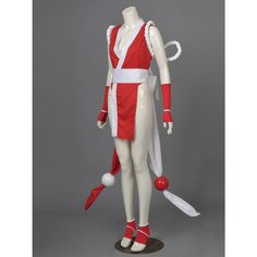 a white mannequin wearing a red and white costume