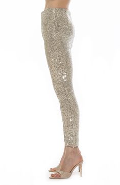 Sparkle all night long in dazzling sequin-embellished leggings fashioned in an ankle-length silhouette with zipper hems. 28" inseam; 10" leg opening; 10 1/2" front rise; 15 1/2" back rise Hidden side-zip closure Zip hems Lined 92% polyester, 8% spandex Hand wash, line dry Imported Embellished Leggings, Sequin Leggings, Nordstrom Store, Leggings Fashion, Ankle Length, Side Zip, Nordstrom Rack, Sequin, Hand Wash