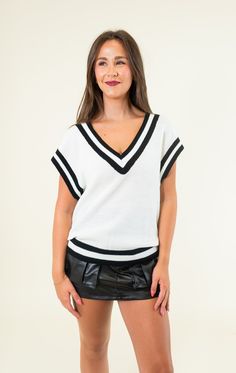 V-neck Contrasting stripes Sleeveless Knit Non-sheer 95% Acrylic; 5% Nylon SIZES: SMALL MEDIUM LARGE Add a pop of personality to your wardrobe with our Striped Detail Sweater Vest! Available in classic cream and edgy black, this vest adds a touch of style to any outfit. A must-have for any fashion-forward individual. SIZE XS S M L XL 2XL 3XL FITS A SIZE 00-0 2-4 6-8 10-12 14-16 18-20 22-24 Platform Heels Boots, Sandal Platform, Sleeveless Knit, Blue And White Dress, Detailed Sweater, Platform Sandals Heels, Dress Romper, Size 00, Skirt Pants