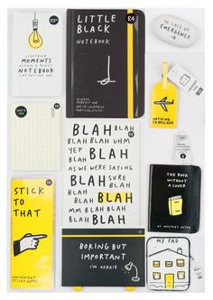 various notebooks and stickers are arranged on a white surface with black writing in the middle