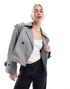 Stradivarius oversized cropped trench coat in slate gray | ASOS Modern Cropped Jacket With Lapel Collar For Fall, Trendy Cropped Jacket With Lapel Collar And Button Closure, Double-breasted Cropped Jacket With Pockets For Spring, Collared Cropped Jacket With Double Button Closure For Work, Trendy Pea Coat With Double Button Closure, Gray Button-up Outerwear With Button Cuffs, Trendy Cropped Blazer With Pockets, Winter Double-breasted Cropped Jacket With Button Closure, Fall Cropped Button-up Jacket With Double Button Closure