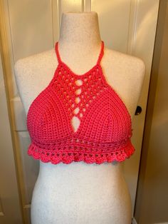 woman's Small (A cup) Color- Tropical pink Smoke free home Pink Halter Top With Built-in Bra, Pink Summer Halter Top With Built-in Bra, Pink Triangle Top With Built-in Bra, Pink Stretch Halter Neck Tank Top, Pink Triangle Crochet Top For Summer, Pink Crop Top With Built-in Bra For Vacation, Pink Triangle Crochet Top For Beach, Pink Triangle Crochet Top For The Beach, Pink Sleeveless Crochet Top For Beach