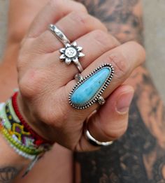 Bohemian Silver Larimar Jewelry, Adjustable Celestial Gemstone Jewelry, Bohemian Adjustable Stackable Turquoise Ring, Adjustable Stackable Bohemian Turquoise Ring, Stackable Turquoise Jewelry For Festivals, Adjustable Spiritual Crystal Ring With Large Stone, Bohemian Stackable Blue Turquoise Ring, Bohemian Blue Stackable Turquoise Ring, Blue Spiritual Stackable Jewelry