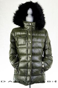 MICHAEL Michael Kors Hooded Quilted Jacket Stand collar; hooded Removable hood Zip pockets at hips Quilted panels, water resistant Fill: polyester Lined 100% nylon; lining:  100% polyester Machine washable Please read before placing a bid. It is your responsibility to ask anything you are unsure of. We are here to assist you. Email us with any questions; if you are unclear about anything please ask. We will respond within 48 hours. After the auction is not the time to ask questions. NOTE REGARDI Olive Long Sleeve Winter Parka, Olive Winter Outerwear For Cold Weather, Olive Outerwear For Cold Weather And Winter, Olive Outerwear For Cold Weather, Designer Hooded Outerwear For Cold Weather, Green Hooded Outerwear With Padded Collar, Michael Kors Hooded Fall Outerwear, Fall Hooded Michael Kors Outerwear, Hooded Michael Kors Fall Outerwear