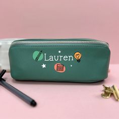 Personalised Pencil Case with hand-drawn classroom items and name. Fully unzips for easy access. Perfect back-to-school or teacher gift! Get ready for the new school year with our charming Personalised Pencil Case, perfect for students and teachers alike. This delightful pencil case features hand-drawn classroom items such as a calculator, a pencil, and a light bulb, all surrounded by whimsical stars. Your child's or teacher's name is proudly displayed in the centre, adding a personal touch that Back To School Pencil-shaped Zipper Pouch, Whimsical Stars, Back To School Pencil-shaped Organizer With Zipper, Pencil-shaped Cosmetic Bag With Zipper For Back To School, Drawing Back, Customizable Pencil-shaped Pencil Case For Back To School, Personalised Pencil Case, Classroom Items, Personalized Multicolor Pencil-shaped Pencil Case