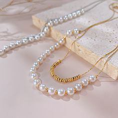 ✦ For a timeless and elegant look in your jewelry, try this Dainty Pearl Beads Layering Chain Necklace. Pairing double-layered pearls with delicate beads, this necklace is perfect for everyday wear and is resistant to tarnishing. Receive daily compliments with this minimal and refined necklace. ----------- DETAILS ----------- - Color: Gold/ Silver - Chain Length: 36.5cm + 6cm - Materials: Gold Plated, 316L Stainless Steel, Faux Pearl *316L Stainless Steel is hypoallergenic, generally safe for sensitive skin. - SKU: GX2309 Basic Jewelry, Nose Rings Hoop, Crystal Hoop Earrings, Fashion Jewelry Earrings, Stylish Jewelry, Gorgeous Necklaces, Bridesmaid Jewelry, Black Crystals, Gold Plated Jewelry