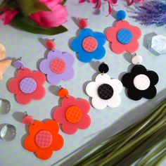 Bring back the totally groovy styles of the 60's and 70's to your retro outfits when you wear these mismatched Daisy Stud Earrings! 💙 Each Mod Fashion Inspired pair of Daisy Flower earrings are made of layered laser cut acrylics! You get to pick which Color Combo your Mismatched Earrings come in! 🧡 Little Circle Studs measure about .5″ and the Big Daisy Flower that dangles below measures 1.85″ wide. 💜 You get to choose which hypoallergenic earring studs these are made with! Choose from: ~ Nic Trendy Multicolor Flower Earrings For Spring, Retro Multicolor Flower Earrings For Gift, Pink Retro Earrings For Spring, Retro Spring Flower Earrings Gift, Retro Adjustable Pink Earrings, Trendy Multicolor Flower Earrings For Party, Spring Retro Flower Earrings Gift, Vintage Multicolor Earrings For Spring, Multicolor Vintage Earrings For Spring