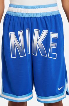 the nike basketball shorts are blue and white with letters on each side that read'nike '