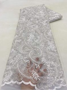 This high quality Fabric is measured in 5 Yards With Embroidered Beading and Sequin. It is soft, very delicate and beautiful. This high Quality Fabric is made with Fashion embroidered rhinestones can be used in making party wedding dresses, skirts, shawls, scarves and other other fashion apparels as you would like. Size : Length : 5 yards (180 inch). Width: 50 inch (Please allow slight deviation for the measurement data ,±1 inch) Material: 100% Polyester, Tulle Lace Fabric, Eco-Friendly embroide Tulle Lace, Wedding Party Dresses, Lace Fabric, Party Wedding, Quality Fabric, 1 Inch, Shawl, Wedding Party, Sequin