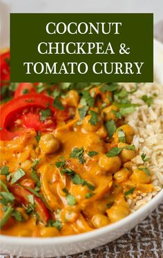 coconut chickpea and tomato curry in a white bowl with rice on the side