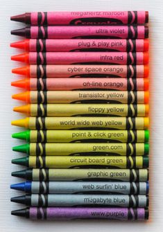 many different colored crayons are lined up together