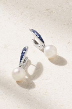 Inspired by water, MIKIMOTO's earrings are set with 0.90-carats of sapphires that range from the lightest blue to a deep shade of midnight. They're made from 18-karat white gold and tipped with the brand's signature Akoya pearls. Mikimoto Pearl Earrings, Mikimoto Earrings, Mikimoto Jewelry, Bling Accessories, The Bling Ring, Sapphire And Diamond Earrings, Sapphire Earrings Studs, Sapphire Studs, Pearl And Diamond Earrings