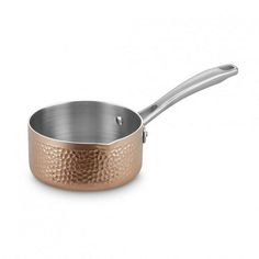 a copper pan with a handle on a white background