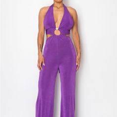 Make A Stylish Statement With Our Solid Slinky Wide Legs Jumpsuit In Vibrant Purple. This Elegant Jumpsuit Features A Sleek Wide-Leg Silhouette And A Modern O-Ring Detail, Perfect For Adding A Touch Of Sophistication To Your Wardrobe. Key Features: - Fabric: Made From 96% Polyester And 4% Spandex, Offering A Smooth, Stretchy Fit That Drapes Beautifully. - Fit: True To Size With A Relaxed, Wide-Leg Design For A Flattering And Comfortable Silhouette. - Color Options: Available In Striking Purple. Fitted Halter Neck Jumpsuit For Loungewear, Fitted Purple Jumpsuits And Rompers For Loungewear, Purple Stretch Jumpsuits And Rompers For Loungewear, Purple Jumpsuits And Rompers For Loungewear, Fitted Purple Jumpsuits And Rompers For Date Night, Denim Coverall, Elegant Jumpsuit, Black Lace Romper, Chambray Romper