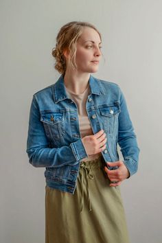 Beat the chill in style with the 'Cheyenne' Jacket! This feminine denim jacket is the perfect piece for layering over your favorite dresses and pairing with fall skirts. With no weird fading or distressing, this jacket has a flattering fit and nice stretch. Style this over a t-shirt dress for a shopping day with friends or over a floral skirt and top for a night out. This is piece you can love for years to come! Fit: true to size; this jacket is less "boxy" than most jean jackets. It has a feminine fit, but lots of stretch so it's not at all restrictive Style: 77% cotton 12% polyester 9% rayon 2% spandex Color: medium wash denim jacket Fabric content: 77% cotton, 12% polyester, 9% rayon, 2% spandex Care instructions: wash gentle cycle, cold; lay flat to dry, cool iron if needed. For best r Trendy Stretch Denim Jacket With Long Sleeves, Trendy Stretch Denim Jacket With Pockets, Stretch Outerwear With Pockets For Everyday, Casual Stretch Button-up Outerwear, Stretch Light Wash Denim Jacket, Medium Wash Stretch Denim Jacket With Long Sleeves, Fitted Cotton Denim Jacket Casual, Stretch Button-up Outerwear For Fall, Casual Stretch Denim Jacket