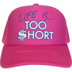 A unisex adjustable snapback trucker hat in pink, with Too $hort "Life Is..." graphic printed on the front. One size fits most. Pink Flat Bill Hat With Letter Print, Pink Fun Snapback Hat With Flat Bill, Fun Pink Snapback Hat With Flat Bill, Pink Snapback Hat With Flat Bill For Summer, Pink Fun Flat Bill Snapback Hat, Pink Flat Bill Trucker Hat For Spring, Pink Fun Trucker Hat With Flat Bill, Pink Fun Style Trucker Hat With Flat Bill, Fun Pink Trucker Hat With Flat Bill