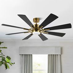 a modern ceiling fan in a living room