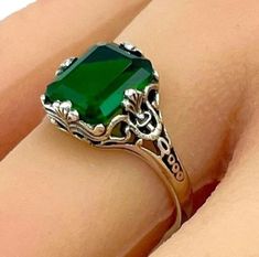 Vintage Solitaire Simulated Emerald In 925 Solid Sterling Silver Filigree Ring. Excellent Condition, Satisfaction Guaranteed! *May Birthstone Formal Green Emerald Filigree Ring, Classic Green Filigree Ring Hallmarked, Green Sterling Silver Classic Filigree Ring, Classic Green Sterling Silver Filigree Ring, Green Emerald Filigree Ring For Anniversary, Classic Green Filigree Ring As Gift, Elegant Engraved Green Rings, Elegant Green Engraved Rings, Classic Green Filigree Ring With Gemstone