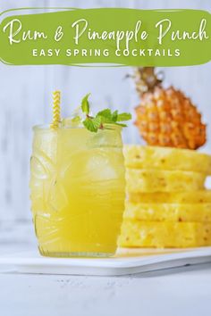 the rum and pineapple punch is served on a plate next to some pineapples