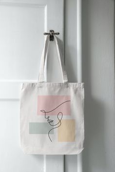 White Rectangular Bag With Graphic Design, White Rectangular Bags With Graphic Design, Rectangular Bag With Graphic Design, Rectangular Bag With Graphic Design For Everyday, Everyday Rectangular Bag With Graphic Design, Rectangular Bags With Graphic Design For Everyday Use, Rectangular Graphic Design Bag For Everyday Use, Face Lines, Art Tote Bag