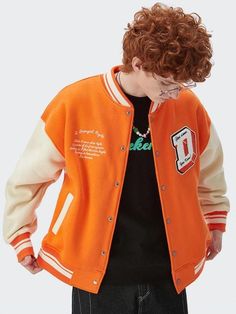 Exude a bold style with the "I Don't Give Damn" bomber jacket. Embellished with patterns, this unisex varsity jacket crafted from a cotton-polyester blend features snap-button front, and twin side pockets. Available in blue, orange, and black - a hoodless trendsetter for your closet. Embroidered patterns Men's & Women's jacket Varsity jacket made of technical fabric Snap-button at front Cotton, polyester Twin side pockets Pockets are sealed, gently pick up the lines to open Unisex No hood Ashbee wears XL and is 6'2 (188cm) Davis wears XL and is 6'1 (186cm) Billy wears XL and is 5'7 (173cm) Winter College Varsity Jacket With Pockets, Winter Varsity Jacket With Pockets For College, Casual Long Sleeve Outerwear With Letter Patch, Winter Varsity Jacket With Baseball Collar And Pockets, Retro Hooded Patchwork Varsity Jacket, Oversized Casual Varsity Jacket With Patchwork, Casual Oversized Varsity Jacket With Patchwork, College Style Long Sleeve Outerwear With Letter Patch, Cotton Varsity Jacket With Letter Patch And Baseball Collar