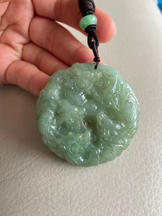 🌈 Chinese 9 Dragons Jadeite Pendant, Round Shape in Green 🌷 Untreated Natural Jadeite/ Grade A Jade 🌷 Certified : YES 🌷 Jade from Myanmar/ Burma 🌷 100% handmade carving 🌷 Chinese 9 Dragons 🌷 Dimensions : 53.8 x 53.8 x 13 mm 🌷 Color : Green 🌷 Free standard shipping from Hong Kong with tracking included 🌷 Take approximately 7-21 days to arrive worldwide 🔥 Recommended items look similar: 👍 https://www.etsy.com/listing/727799025 ❤️ In Chinese Culture: Young people wear jade pendant will Green Amulet Round Necklace, Green Amulet Style Round Necklace, Green Round Amulet Necklace, Handmade Round Green Emerald Necklace, Green Carved Amulet Necklace, Carved Green Round Jewelry, Green Carved Round Jewelry, Green Oval Carved Necklace, Handmade Green Emerald Necklace With Round Pendant