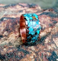 * Mixed Turquoise Copper Ring Band. * Choice of wide. 8 mm and 10 mm. Mark your wide on the option. * Mark your Ring Size on the option. Artisan Blue Rings With Patina, Unique Blue Patina Rings, Turquoise Patina Ring As A Gift, Turquoise Ring With Patina As Gift, Gift Turquoise Ring With Patina, Hand Engraved Wedding Band, Western Wedding Rings, Tucson Gem Show, Gold Ring Designs