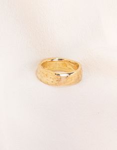 Hand-carved texturized band available in solid 14k Yellow, White, or Rose Gold. Approx. 6mm wide and 7.5g. This luminous double-wide Divinité band embodies the strength of effervescent, exuberant Love. Love is Sacred and Divine - it is the miraculous gift of the Holy Spirit, making up the world we live in. A reminder to keep love at the forefront of all you do, a token of celebration, steadfastness and joy, a talisman of your angels guiding you through unconditional self-love and the ability to 14k Gold Thick Band For Promise, Thick Band 14k Gold Promise Ring, Yellow Gold Thick Band Jewelry For Promise, Yellow Gold Promise Jewelry With Thick Band, Yellow Gold Thick Band Promise Jewelry, Thick Band Engraved Promise Ring, 14k Gold Hammered Bands, 14k Gold Thick Band With Diamond Cut, Promise Jewelry In Hammered Yellow Gold