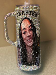 a coffee mug with a photo of a woman on the side and words crafter