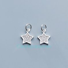 Sterling Silver Charm, Vermeil Charms, 925 Silver Star Charm Bulk Supplies Wholesale For Bracelet Necklace Q0254 Material: 925 sterling silver Color: silver  Size: 11*9*1.5mm Weight: 0.6g Please contact us if you need bulk! More star charms: https://www.etsy.com/shop/ClarenceJewelry?ref=seller-platform-mcnav&search_query=star+charmRing Blanks:  https://www.etsy.com/shop/ClareAccessories?section_id=33588047 Pendant Blanks:  https://www.etsy.com/shop/ClareAccessories?section_id=33438454 Charms:  https://www.etsy.com/shop/ClareAccessories?section_id=29352850 Findings:  https://www.etsy.com/shop/ClareAccessories?section_id=37786581 Necklaces:  https://www.etsy.com/shop/ClareAccessories?section_id=33438204 Beads:  https://www.etsy.com/shop/ClareAccessories?section_id=29620904 Earring Blanks:  h Elegant Silver Star Charm, Sterling Silver Star-shaped Charms, Silver Star Sterling Silver Charms, Silver Sterling Silver Star Charms, Silver Star-shaped Sterling Silver Charms, Silver Star Charm, Bracelet Charm, Star Charms, Silver Stars