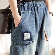 Details: Gender: Women Item Type: Jeans Material: Denim Season: Spring, Autumn Pattern: Patchwork Style: Casual, Loose, Retro Waist Type: Elastic Waist Size: One Size Waist: 64.00 - 100.00 cm/ 25.20 - 39.37 " Length: 88.00 cm/ 34.65 " Hip: 128.00 cm/ 50.39 " Hem: 34.00 cm/ 13.39 " Casual Patchwork Denim Blue Bottoms, Casual Denim Blue Patchwork Bottoms, Baggy Patchwork Cotton Jeans, Baggy Cotton Patchwork Jeans, Casual Denim Blue Patchwork Jeans, Casual Denim Blue Jeans With Patchwork, Casual Patchwork Denim Jeans, Casual Wide Leg Patchwork Jeans, Spring Denim Blue Jeans With Patch Pockets