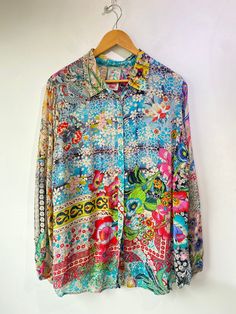 Johnny Was Floral Print Top! Has long sleeves, a classic collar, and buttons up the front. 100% rayon. Size large, please refer to measurements. In excellent condition! Approx. Measurements: Underarm to Underarm: 22" Sleeve Length: 25" Length: 29.5" Bohemian Long Sleeve Shirt With Buttons, Multicolor Long Sleeve Shirt With Button Closure, Spring Bohemian Long Sleeve Shirt, Bohemian Long Sleeve Spring Shirt, Bohemian Long Sleeve Shirt For Spring, Spring Long-sleeve Multicolor Print Blouse, Spring Multicolor Print Long Sleeve Blouse, Multicolor Long Sleeve Relaxed Fit Blouse, Multicolor Floral Print Long Sleeve Blouse