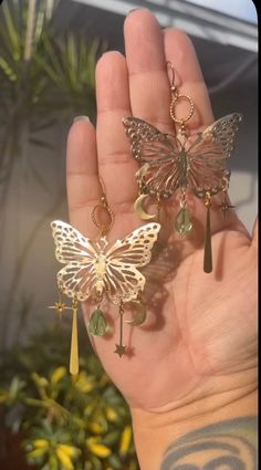 brass butterfly earrings with brass charms and beads. earring hook is hypoallergenic Butterfly Piercing, Insect Earrings, Brass Butterfly, Hamsa Earrings, Big Butterfly, Pretty Jewelry Necklaces, Prom Earrings, Modern Tattoos, Earring Hook