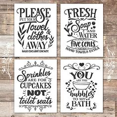 four black and white printables on wood