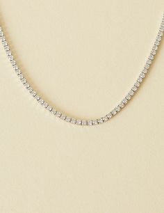 BEHIND THE DESIGN A tennis chain refers to a continuous and complete strand of sparkling stones, with a prong setting. Designed to sparkle, with one side featuring Cubic Zirconia stones and the back of the chain a smooth metal surface. The most classic of all necklaces, this makes a perfect gift! DETAILS Metal: 925 Sterling Silver with rhodium plating, nickel-free. Stones: Cubic Zirconia Dimensions: 40cm+5cm extension (16 inches+2 inches extension) Tennis Chain, Metal Surface, Tennis Necklace, The Chain, Lemon Quartz, Recycled Gold, Jewelry Plate, Earings Piercings, Earring Necklace