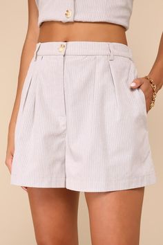 Prepare to make a stylish impression whenever you don the Lulus Posh Certainty Beige Pinstripe Linen Pleated High-Rise Shorts! A pinstriped design accents lightweight, linen-cotton blend woven fabric as it shapes these chic shorts with an elasticized high-rise silhouette, belt loops at the front, and a top button closure with a hidden zip-fly. Pleated accents and side seam pockets complete the tailored silhouette. Pair with the matching top for a complete look! Fit: This garment fits true to siz Chic Vertical Striped Shorts, Chic Shorts With Vertical Stripes, Elegant Pinstripe Bottoms For Summer, Chic High Waist Striped Shorts, Chic Striped Cotton Shorts, Chic Vertical Striped Shorts For Summer, Chic Striped High-waisted Shorts, Chic Summer Shorts With Vertical Stripes, Striped Shorts For Day Out