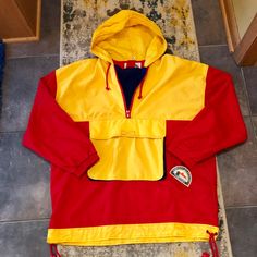 Vintage Dead Stock New With Tags . Concept Clothing Company Pullover Colorblock Jacket . Vintage Sz. L More Of A M Vibrant Red & Yellow With 1/4 Zip And Front Pouch Pocket With Zip Side Entry Pockets . Fold-Away Hood . Retro Yellow Windbreaker For Fall, Retro Yellow Windbreaker For Winter, Retro Yellow Outerwear With Pockets, Vintage Yellow Windbreaker For Winter, Retro Yellow Windbreaker For Streetwear, Yellow Retro Windbreaker For Streetwear, Retro Yellow Hooded Windbreaker, Yellow Color Block Hooded Outerwear, Yellow Hooded Color Block Outerwear