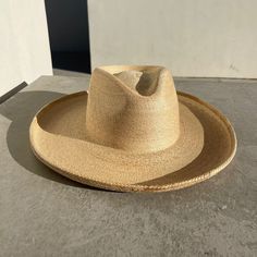 MEET THE SIGNATURE PENCIL ROLL BRIM RANCHER INSPIRED BY WESTERN HERITAGE. One of the few designs available in fine palm with a pencil brim! Made of 100% Palm Leaf Straw that is non-toxic, purely organic, re-shapable, and water-shedding. Fine organic palm leaf is self-conforming to the shape of your head with an #inclusive design that is unisex and universally flattering. The new design features the same wide brim with an oversized Pencil Roll Brim. Delivering on our sustainable promise, this hat Artisan Fedora With Curved Brim In Toquilla Straw, Toquilla Straw Fedora With Curved Brim, Handwoven Toquilla Straw Hat With Curved Brim, Short Brim Toquilla Straw Panama Hat, Western Palm Leaf Hat With Curved Brim, Toquilla Straw Panama Hat With Short Brim, Artisan Panama Hat With Flat Brim In Toquilla Straw, Brimmed Toquilla Straw Panama Hat, Artisan Toquilla Straw Panama Hat With Flat Brim