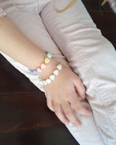 "If you would like to add gold filled hardware to a bracelet, please use this link to purchase it along with the bracelet. You will need to purchase one for EACH bracelet you would like to add gold filled hardware to. https://www.etsy.com/LittleLovliesShop/listing/860546443/gold-filled-upgrade?utm_source=Copy&utm_medium=ListingManager&utm_campaign=Share&utm_term=so.lmsm&share_time=1598757365437 Rainbow Heart Bracelet. These colorful pastel beads are aligned in a rainbow pattern a Adjustable White Hypoallergenic Heart Bracelet, Adjustable Hypoallergenic White Heart Bracelet, Adjustable Heart Beads Bracelet For Birthday, Cute Adjustable Bracelets With Heart Beads, Adjustable Pearl Bracelet With Heart Charm Gift, Cute Nickel-free Friendship Bracelets, Cute Nickel-free White Bracelets, Nickel-free White Bracelets For Birthday, Heart-shaped Hypoallergenic Bracelet For Birthday