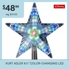 a blue lighted star on top of a pole with the words, $ 48 99 reg $