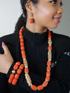 Handmade African Coral Necklace Set Festive Orange Jewelry For Gift, Festive Orange Jewelry Gift, Orange Festive Jewelry For Celebration, Festive Orange Jewelry For Celebration, Orange Festive Celebration Jewelry, Elegant Beaded Festive Sets, Elegant Beaded Sets For Festive Occasions, Elegant Beaded Sets For Festive Season, Elegant Adjustable Wedding Sets