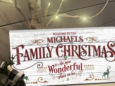 a wooden sign that says welcome to the family christmas