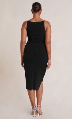 Sleeveless high neck midi in a timeless silhouette that flatters all body shapes. The midi dress is cut from a stretch bonded crepe fabric that cinches in the body and skims the silhouette. The Be Mine Tuck Midi Dress features a slight gathering detail at the waist and hips for a more comfortable fit. Sleeveless Midi Dress With Flattering Silhouette, Chic Sleeveless Midi Dress In Elastane, Chic Midi-length Sleeveless Elastane Dress, Fitted Black Sleeveless Dress With Side Slits, Fitted Sleeveless Dress With Side Slits For Night Out, Bodycon Sleeveless Midi Dress In Elastane, Sleeveless Elastane Midi Dress For Formal Occasions, Bodycon Sleeveless Midi Dress, Black Sleeveless Elastane Midi Dress