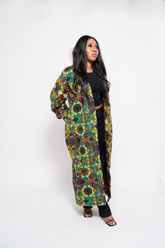 The Nnenna African print Ankara kimono is a must have, every lady deserves this stunner in her closet.  There are different beautiful ways to wear and style this kimono/jacket/dress. It can be worn as a kimono over a dress, it can also be worn over a trouser and top, skirt and top, over a jumpsuit and more. It can also be worn alone as a wrap dress when paired with a belt as seen in the picture.  It all depends on your mood, if you want a casual look, classy look, or even going out for an occasi Kimono Ankara, African Kimono, African Print Kimono, African Gowns, Ankara Kimono, Ankara Jackets, Ankara Tops, Dinner Dates, Dress African