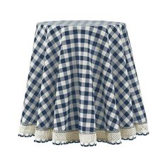 a blue and white checkered tablecloth with lace trims on the edges,