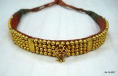 Vintage antique tribal old 22kt gold beads choker necklace from rajasthan India. Great design good for jewelry collection.Note - Gold beads are filled with wax. Please check pictures carefully for more detail.Groos weight - 73.5 gramsNet gold weight approx - 24 gramsGold beads length - 26.7 cm (10.5 inches)Gold beads width - 2 cm (0.8 inches)Length free size can be adjsut by back thread knot. Dholki Beads Necklace Gold, Thushi Necklace Gold Designs, Antique Gold Meenakari Temple Necklace, Antique Gold Temple Necklace With Meenakari, Gold Kundan Necklace With Cutdana For Rituals, Traditional Gold Kundan Necklace With Cutdana, Vintage Gold Necklace With Meenakari, Vintage Gold Meenakari Necklace, Traditional Gold Kundan Necklace For Navratri