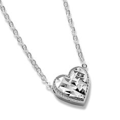 This 14-karat white gold heart necklace features a textured surface to reflect more light  delivering beautiful shine. It comes on a matching diamond-cut cable chain with a secure lobster clasp for worry-free wear. Elegant Sterling Silver Heart Necklace With Cable Chain, White Gold Heart Pendant Necklace With Cable Chain, Silver Heart Cut Necklace With Delicate Chain, Silver Heart Necklace With Delicate Chain, Silver Heart-shaped Jewelry With Cable Chain, White Gold Necklace With Delicate Heart Cut Chain, Silver Heart Jewelry With Cable Chain, Silver Necklace With Heart Pendant And Cable Chain, Silver Heart Pendant Necklace With Cable Chain