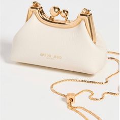 Apede Mod Crossbody Bag Dust Bag And Original Box Included Beige Gold Chain Questions? Leave A Comment Below! White Shoulder Bag With Gold-tone Hardware As Gift, White Bags With Gold-tone Hardware For Gifts, White Bags With Gold-tone Hardware As A Gift, White Crossbody Evening Bag With Detachable Handle, White Crossbody Evening Bag For Everyday, Chic White Evening Bag For Everyday Use, White Crossbody Clutch With Detachable Strap, White Crossbody Evening Bag With Detachable Strap, White Top Handle Evening Bag With Removable Pouch